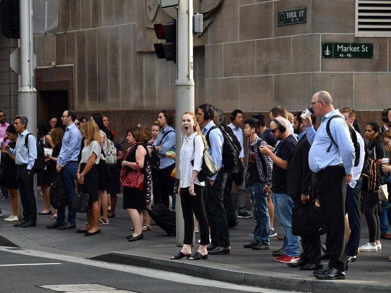 Almost 40 per cent of workers in a survey said five days a week in the office was now mandated. (Mick Tsikas/AAP PHOTOS)