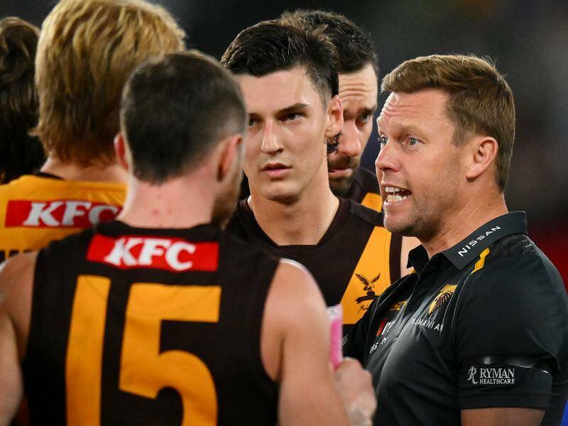 Hawthorn coach Sam Mitchell has been working extra hard to keep his in-form Hawks grounded. Photo: Morgan Hancock/AAP PHOTOS