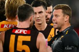 Hawthorn coach Sam Mitchell has been working extra hard to keep his in-form Hawks grounded. Photo: Morgan Hancock/AAP PHOTOS
