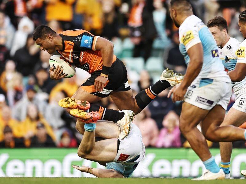 Rampaging Wests Tigers prop Stefano Utoikamanu (l) has been given permission to talk to rival clubs. (Mark Evans/AAP PHOTOS)