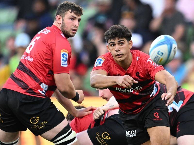 A try by scrumhalf Noah Hotham (right) helped the Crusaders score an upset win over the Blues. (Joel Carrett/AAP PHOTOS)