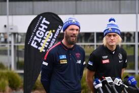 Rival skippers Max Gawn and Darcy Moore will be key protagonists in the King's Birthday clash. (Joel Carrett/AAP PHOTOS)