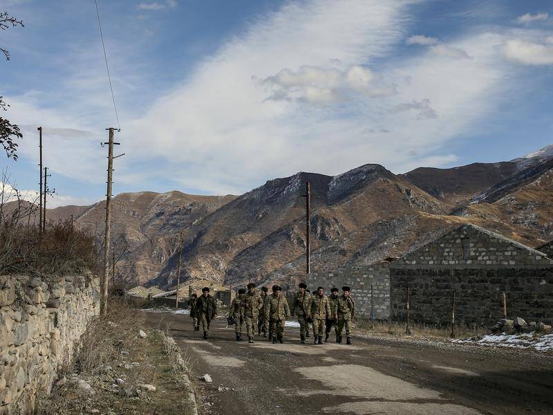 Armenia and Azerbaijan say the deal to return border territory is a milestone on the road to peace. (AP PHOTO)
