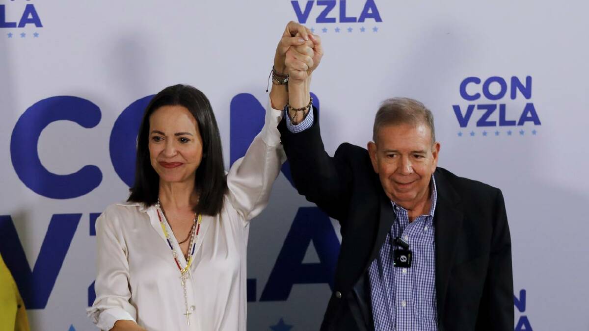 Opposition leader Maria Corina Machado and candidate Edmundo Gonzalez say they have proof they won.  (AP PHOTO)