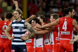 Victory over Geelong sent Sydney two games clear at the top of the AFL. (Dean Lewins/AAP PHOTOS)