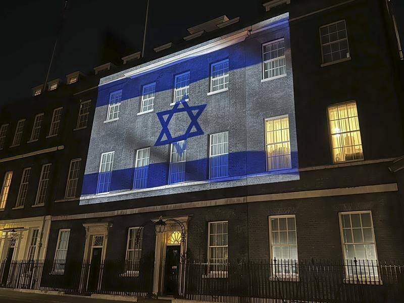 Australia is joining other countries such at the UK by beaming Israeli colours in solidarity. (AP PHOTO)