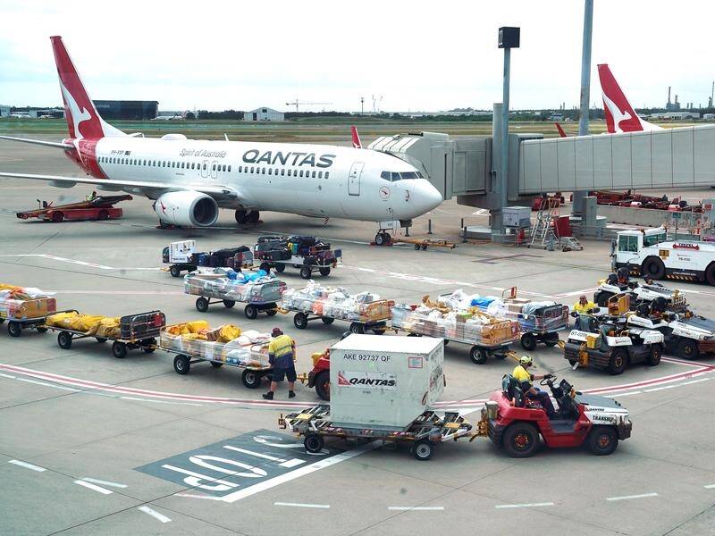 A judge is considering how much compensation, if any, is payable to sacked Qantas workers. (Dave Hunt/AAP PHOTOS)