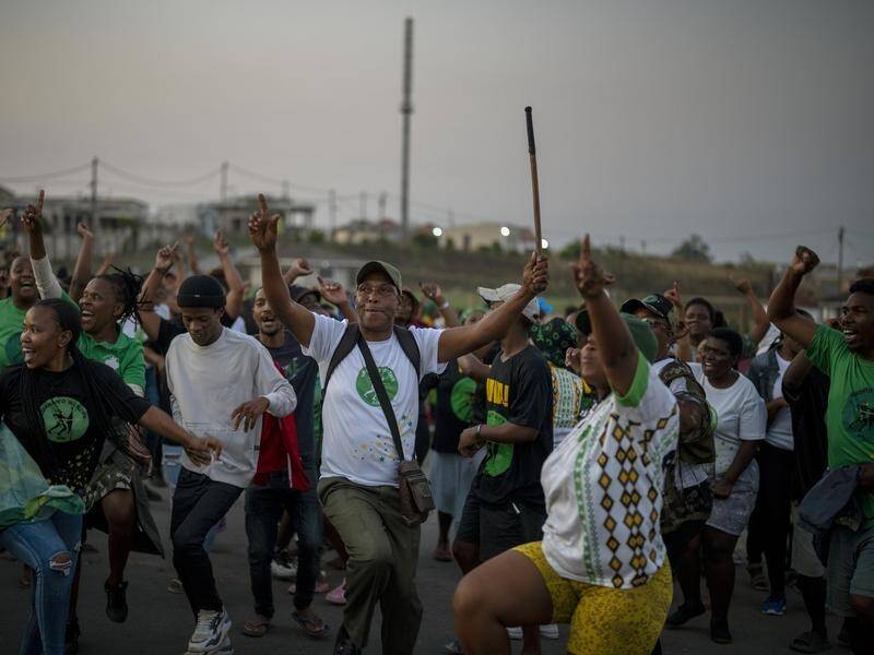 MK Party supporters dance in the middle of the street in Mahlbnathini village in South Africa. (AP PHOTO)