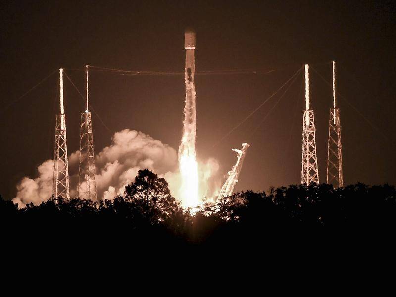 A SpaceX Falcon 9 rocket lifts off from Cape Canaveral carrying a batch of Starlink satellites. (AP PHOTO)