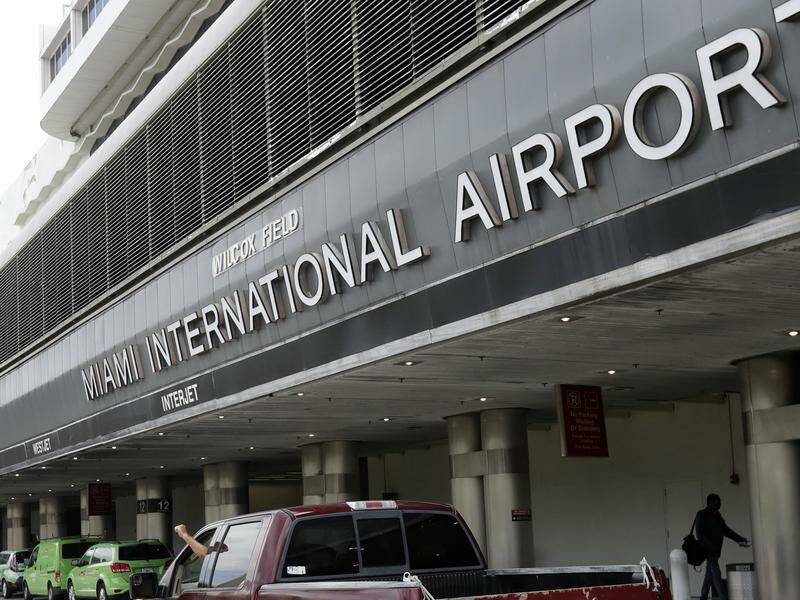 Authorities say the arrival of police at Miami International Airport confused some travellers. Photo: AP PHOTO