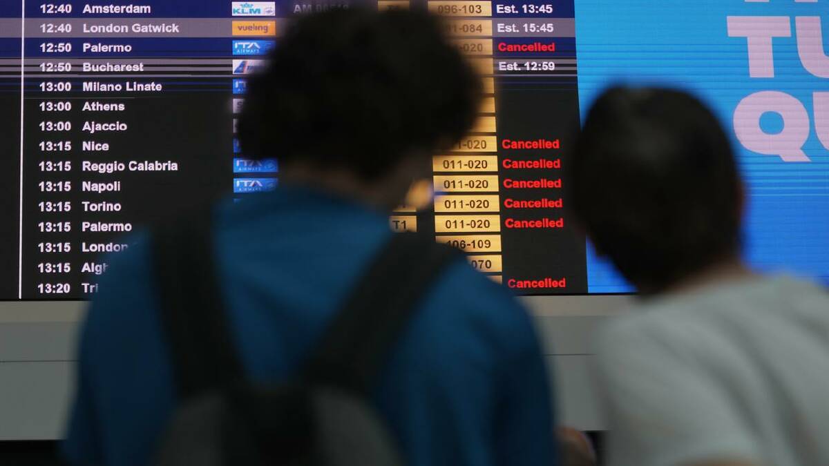 Travellers in North America, Europe and Asia have faced delays and cancellations due to the outage. (AP PHOTO)