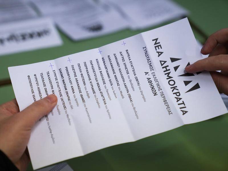 Analysts say New Democracy will win Greece's election but may be short of an absolute majority. (AP PHOTO)