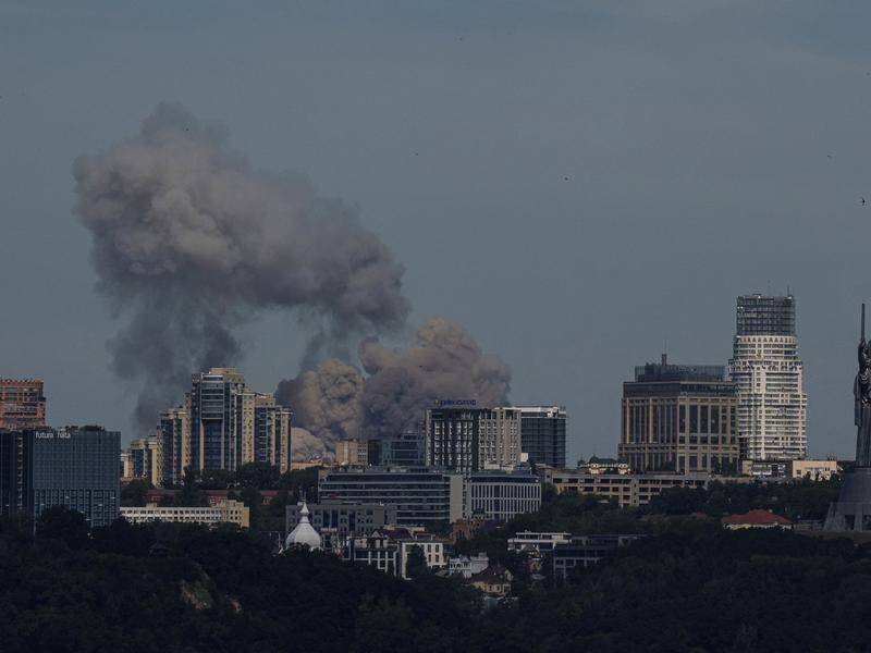 Russian missiles have hit Ukraine's capital Kyiv and other cities in a rare daytime attack. (AP PHOTO)
