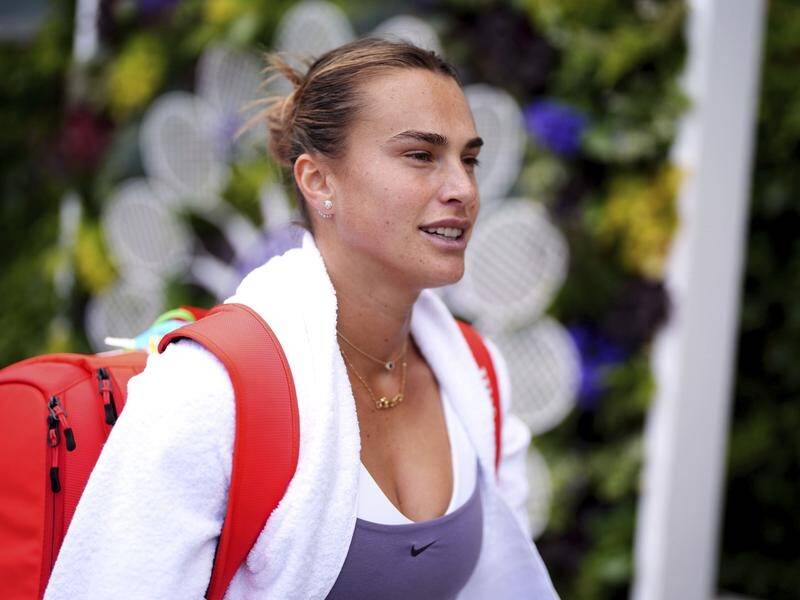 Aryna Sabalenka, pictured at Wimbledon on Monday, has withdrawn because of a shoulder injury. (AP PHOTO)