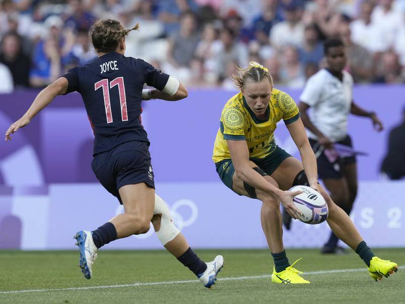 One of seven Maddison Levi tries in the first two matches of Australia's rugby sevens campaign. Photo: AP PHOTO