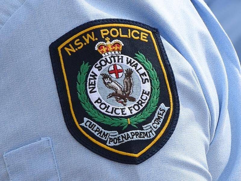 NSW Police have resisted handing over a manual on "less lethal" tactics to an official watchdog. (Dean Lewins/AAP PHOTOS)