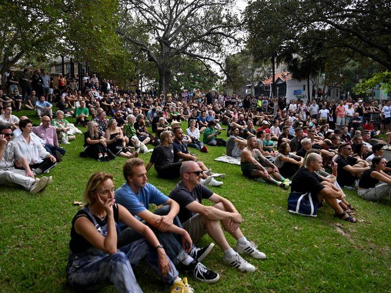 Hundreds gathered in a Sydney park for a vigil to honour slain couple Luke Davies and Jesse Baird. (Bianca De Marchi/AAP PHOTOS)
