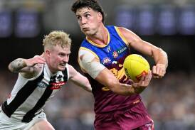 Jarrod Berry (right) has overcome shoulder issues and is keen to be a long-term Brisbane Lion. (Darren England/AAP PHOTOS)