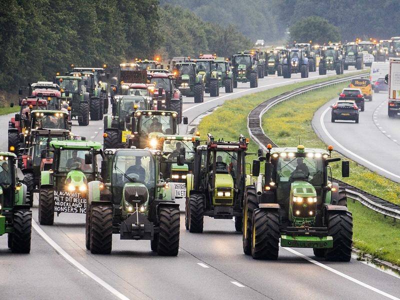 Farmers have slowed traffic in The Netherlands with tractors before a protest in The Hague.