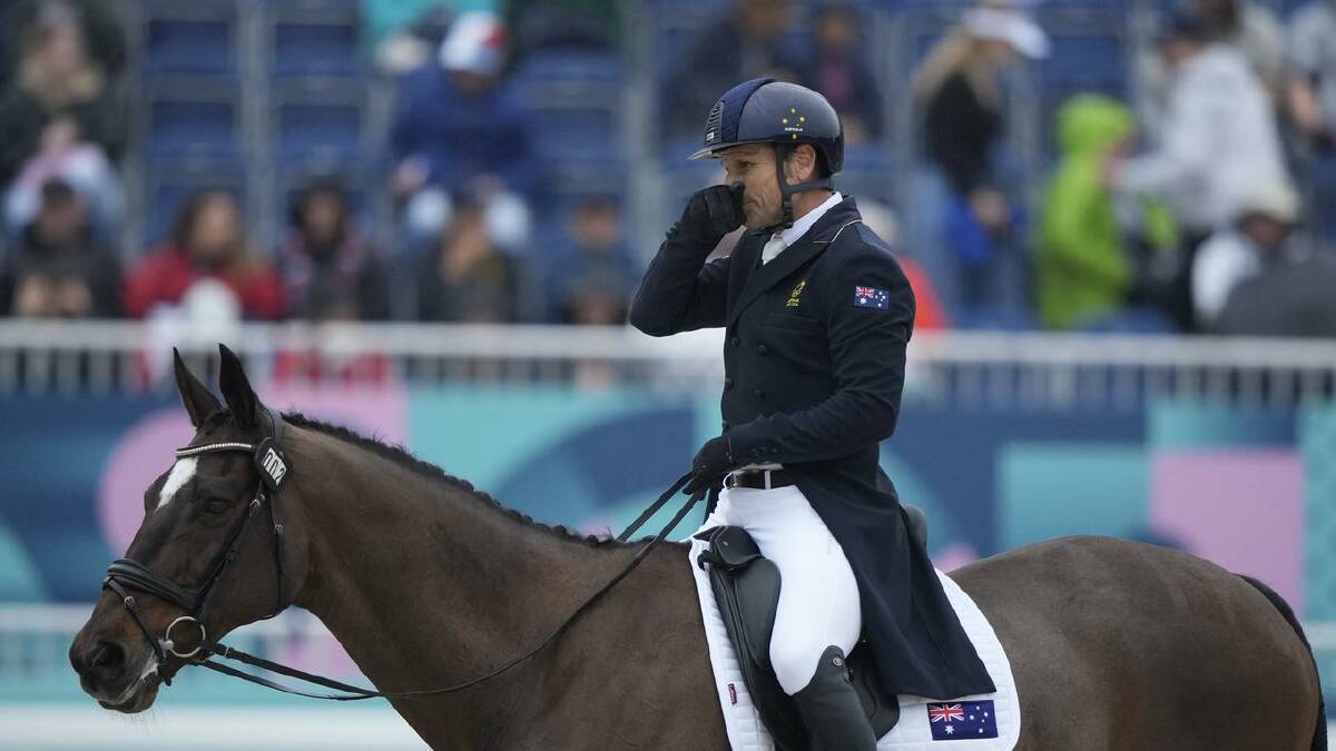 Shane Rose on his horse Virgil during the eventing dressage at Versailles. (AP PHOTO)
