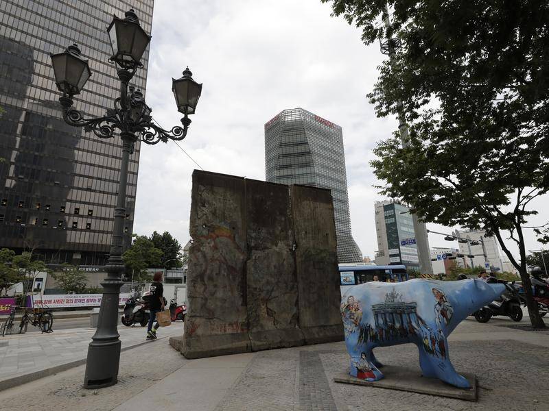 Three sections of the Berlin Wall are displayed in Seoul, South Korea.
