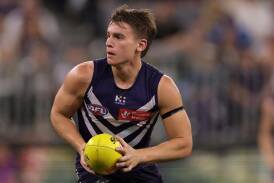 Caleb Serong says the Dockers must trust their game plan to ensure a top-four spot. (Richard Wainwright/AAP PHOTOS)