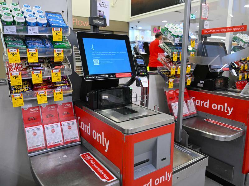 Coles check-outs were affected by the outage that crippled much of the country's systems on Friday. Photo: Lukas Coch/AAP PHOTOS
