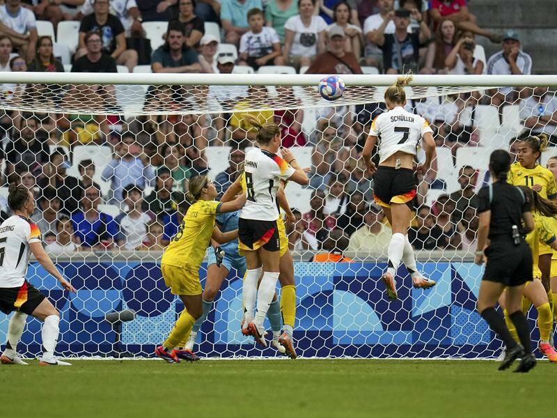 Lea Schueller heads home unmarked as Germany hammered the Matildas 3-0 in Marseille. Photo: AP PHOTO