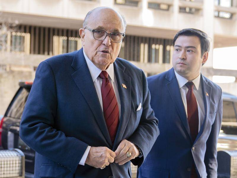 Rudy Giuliani will have to pay two election workers he falsely accused of fraud. (AP PHOTO)