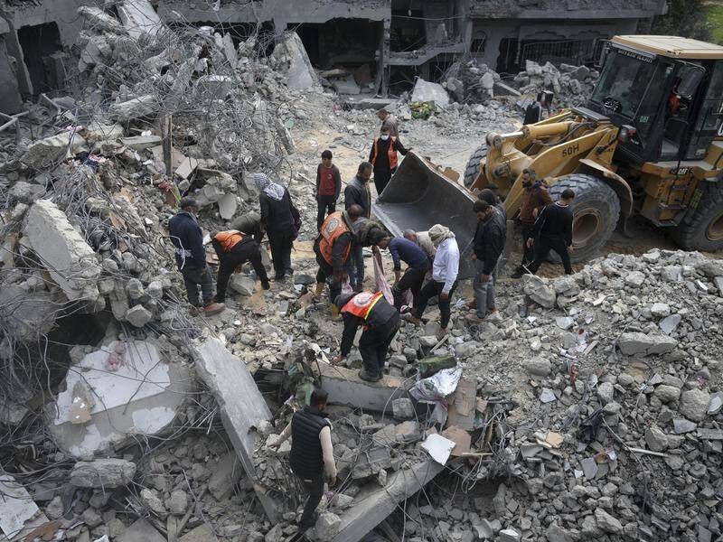 Israeli air strikes have reportedly killed civilians in Deir al-Balah, in the Gaza Strip's centre. (AP PHOTO)