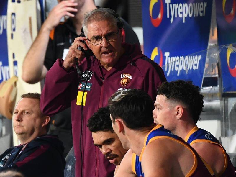 Coach Chris Fagan (centre) wants the Lions to stay focused, with a match looming against Sydney. (Jono Searle/AAP PHOTOS)