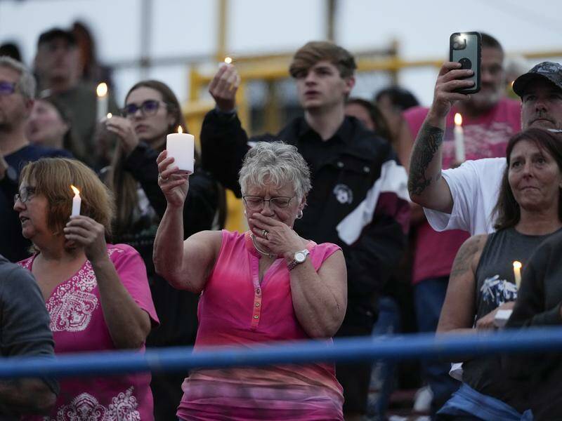 "We need each other ... We need strength. We need healing," the vigil crowd was told. Photo: AP PHOTO