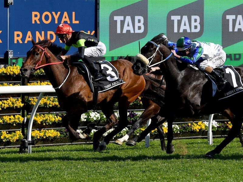 Sam Clipperton rides Think About It (3) to victory ahead of I WIsh I Win at The Everest. (Bianca De Marchi/AAP PHOTOS)