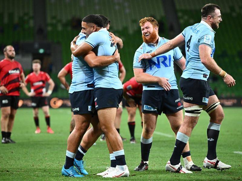 Waratahs players celebrate their shock victory over the Crusaders in Super Rugby Pacific. (Joel Carrett/AAP PHOTOS)