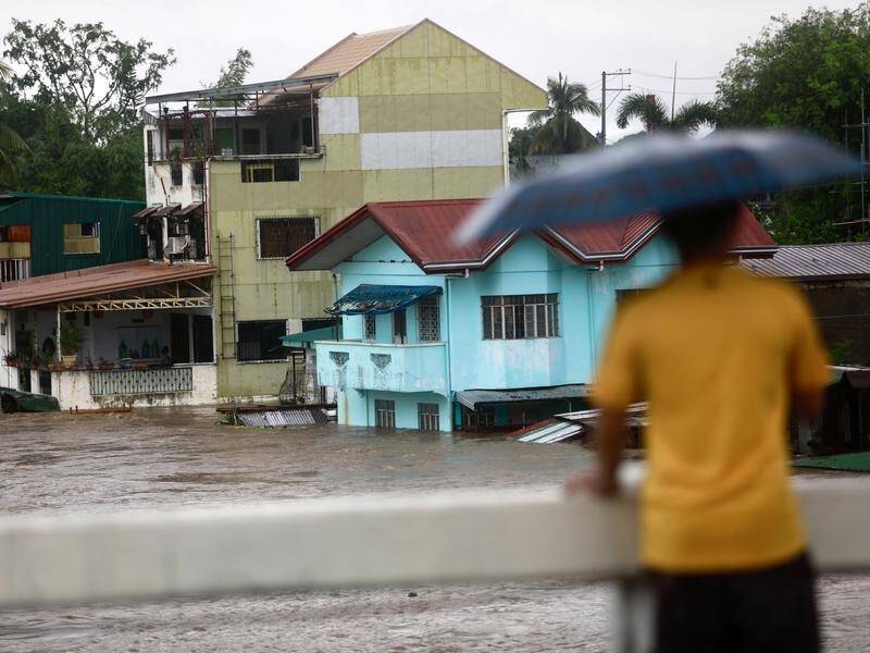 Thousands of people have been evacuated as Tropical Storm Ewiniar hits the Philippines. (EPA PHOTO)