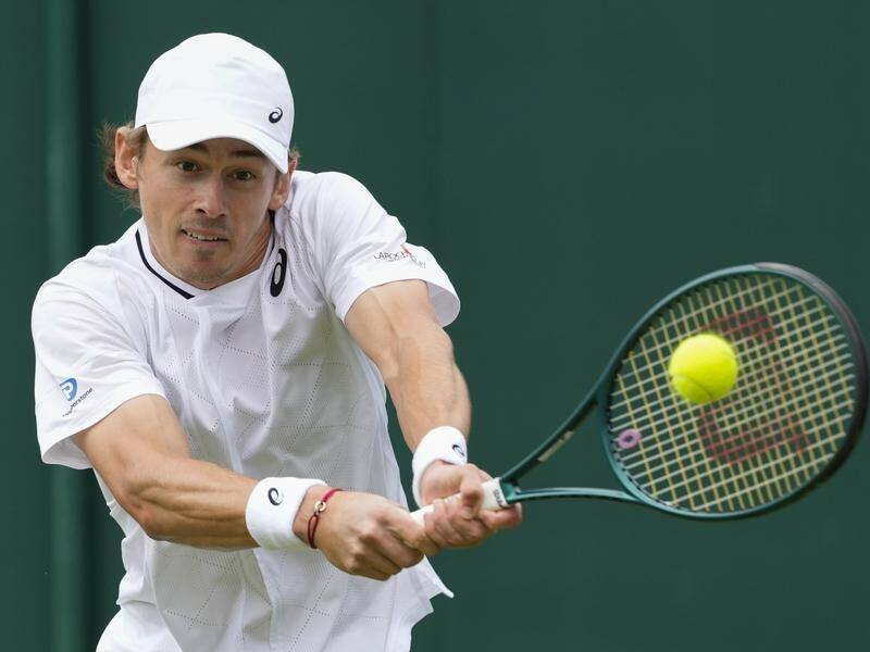 Alex de Minaur has beaten compatriot James Duckworth in the first round at Wimbledon. (AP PHOTO)