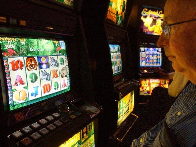 NSW has cut the number of pokies allowed across the state and slashed cash feed-in limits. (Mick Tsikas/AAP PHOTOS)
