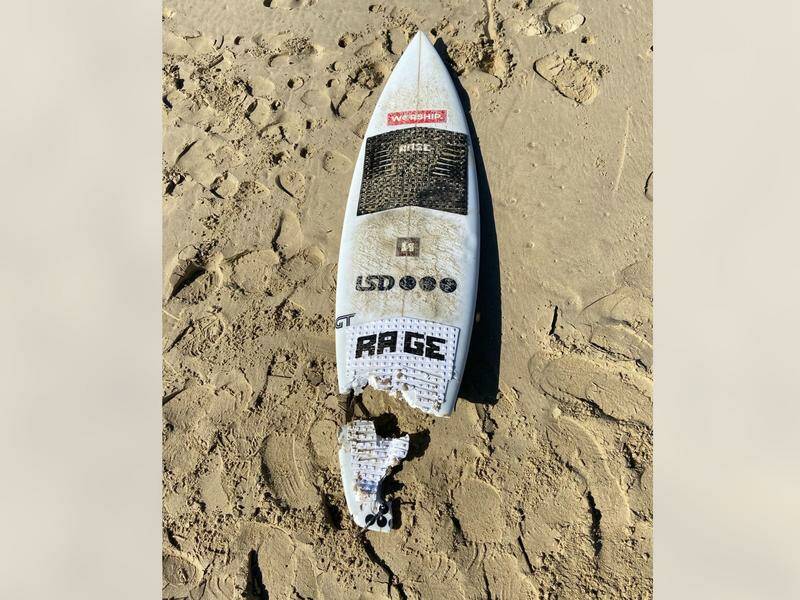The force of a shark's attack split Kai McKenzie's surfboard in two and tore off one of his legs. Photo: HANDOUT/NSW POLICE
