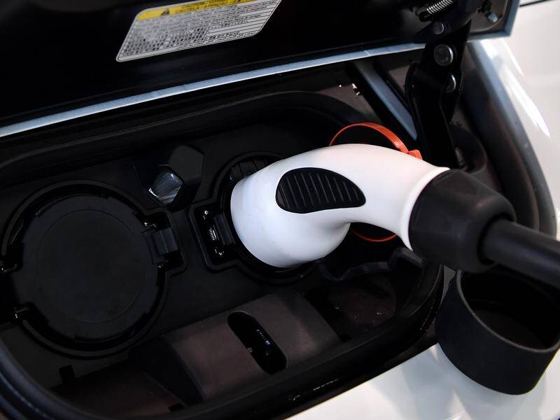 Ampol is betting on more electric vehicle drivers fast-charging at service station forecourts. (Joel Carrett/AAP PHOTOS)