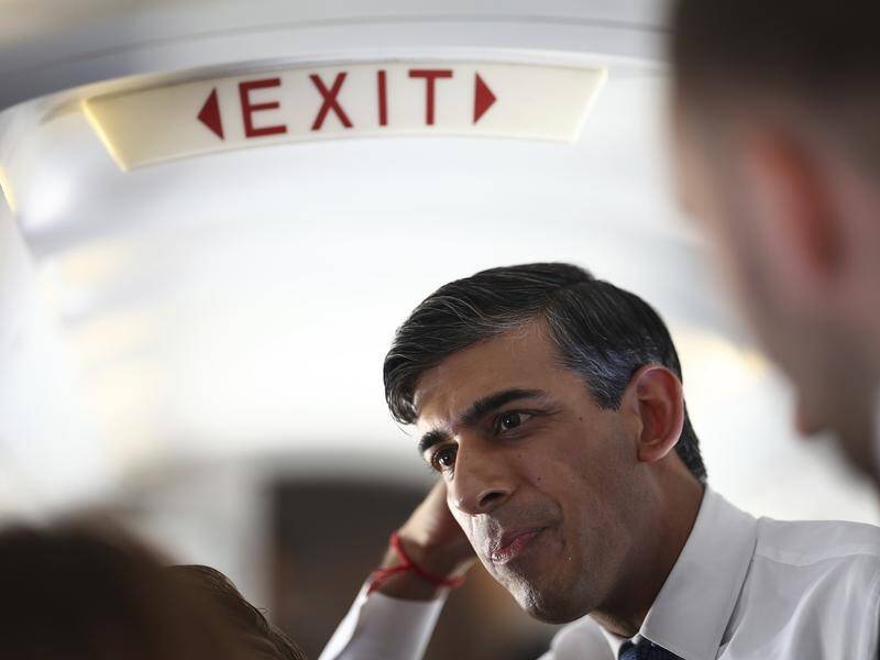 More than 70 members of British Prime Minister Rishi Sunak's party are quitting before the election. (AP PHOTO)