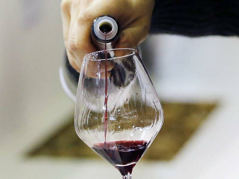 Australian wineries are suffering from a red wine glut as consumption decreases. Photo: EPA PHOTO