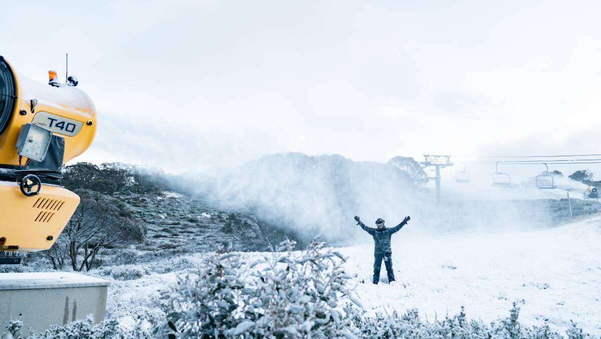 The blast of snow greeted with joy by a resort worker. Pictdure supplied by Perisher resort.