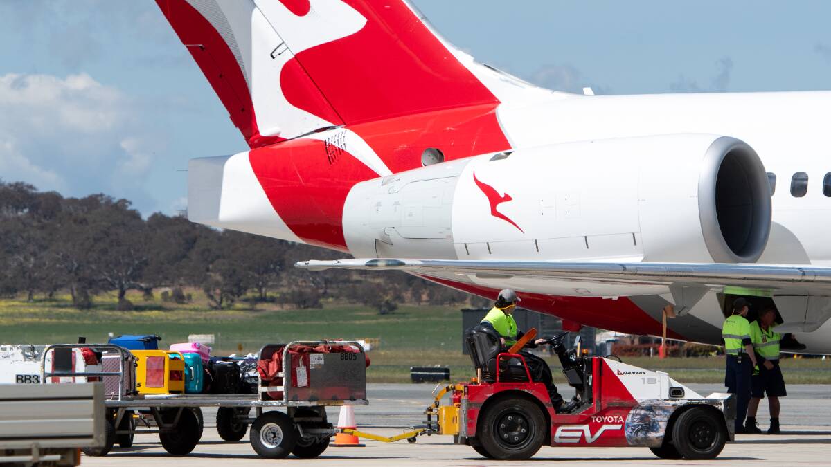 A Qantas flight at Canberra Airport. Picture by Elesa Kurtz