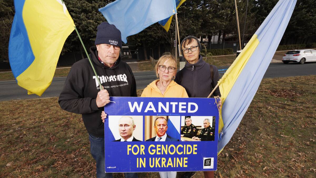 Protesters against the Russian of Ukraine outside the embassy welcomed the block on its expansion. David Hine, Marusya Jacyshyn and Lucy Horodny. Picture by Keegan Carroll