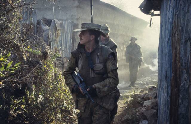 Corporal Terry Burger Conner (front) and Lieutenant Bob Worswick (at rear) in Baidoa, Somalia on March 22, 1993. Picture: Australian War Memorial.