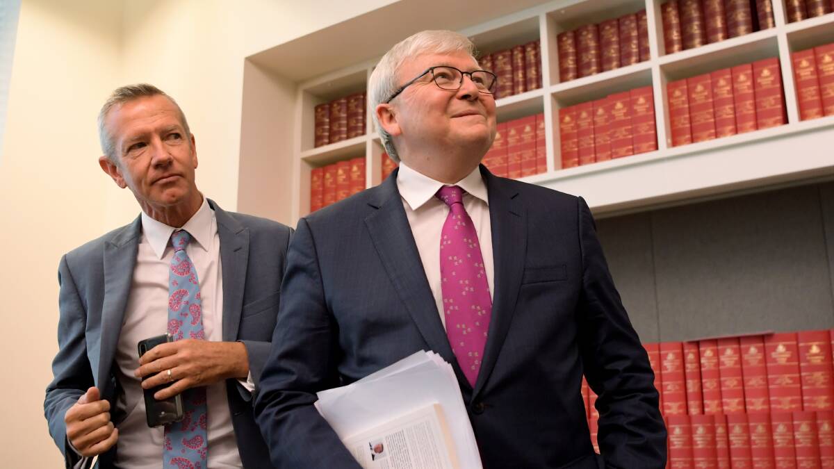Peter Hartcher (left) with former prime minister Kevin Rudd. Picture: Getty Images
