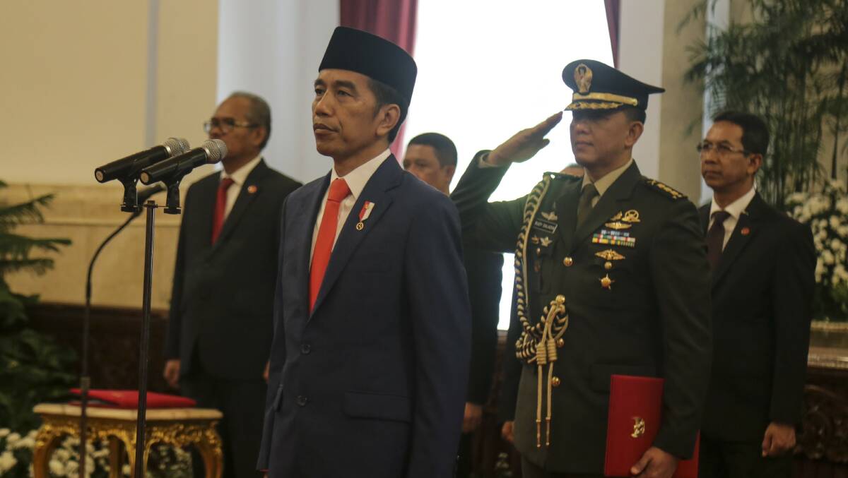 Indonesian President Joko Widodo leads the Inauguration of his new cabinet in Jakarta on October 23. Picture: Getty Images