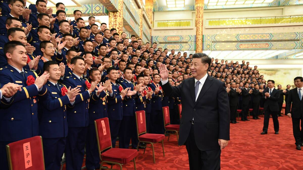 Chinese President Xi Jinping meets with "national role models" in the field of emergency management and firefighting at the Great Hall of the People in Beijing. Picture: Getty Images