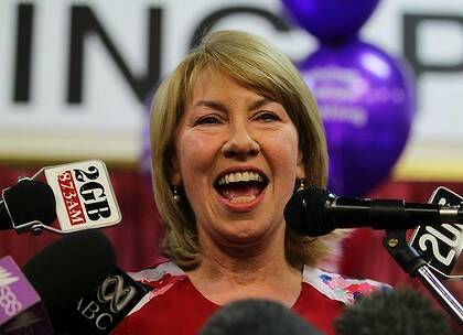 Still smiling ... Maxine McKew makes a speech after losing her Bennelong seat.