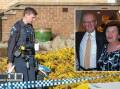 Forensic police officers attend a home in Fisher. Inset: Donald and Jean Morley. Pictures by Karleen Minney, supplied